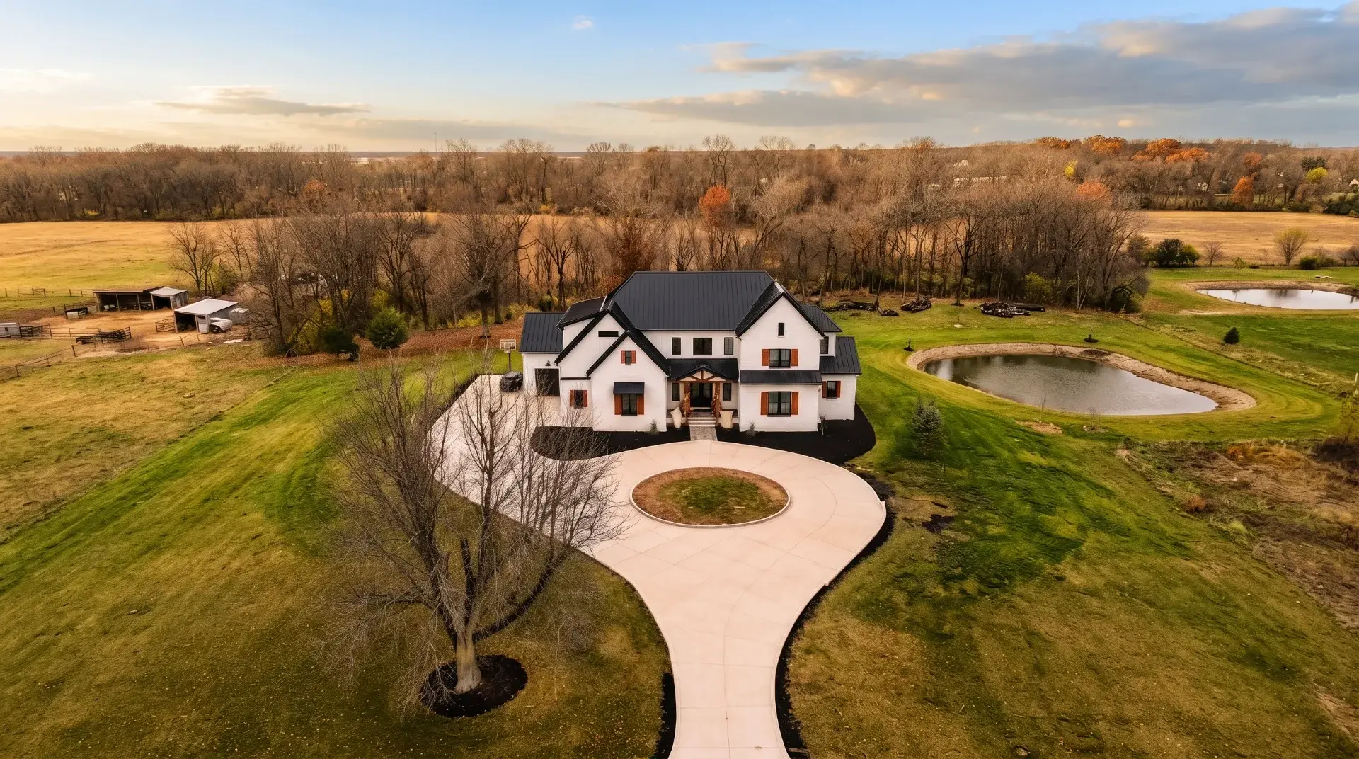 Custom concrete driveway and outdoor living space by Maxima Concrete in Ohio